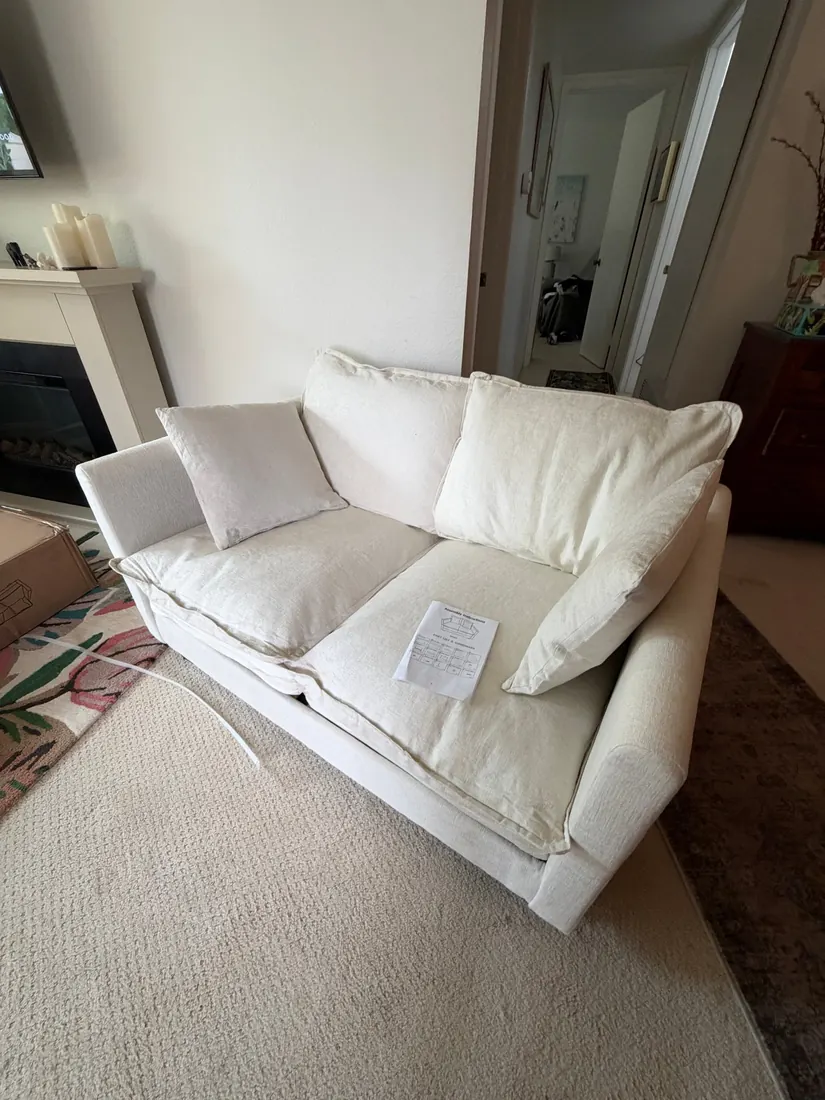 Upholstered loveseat assembled in San Clemente, October 2026