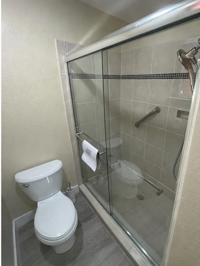 New shower sliding door installed, after