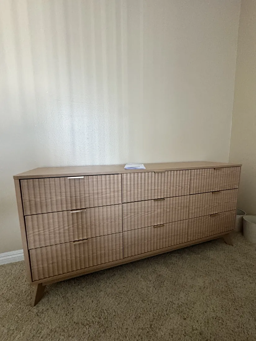 Nine-drawer fluted dresser assembled in Newport Beach, October 2026