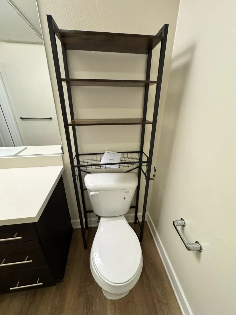 Over-the-toilet storage shelf assembled in Irvine, September 2026
