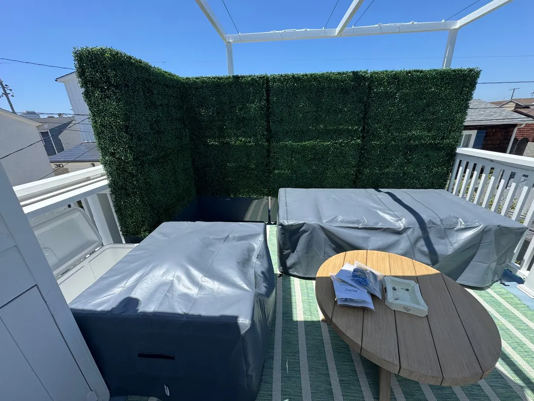 Artificial privacy hedge panels installed on a Newport Beach balcony, May 2025