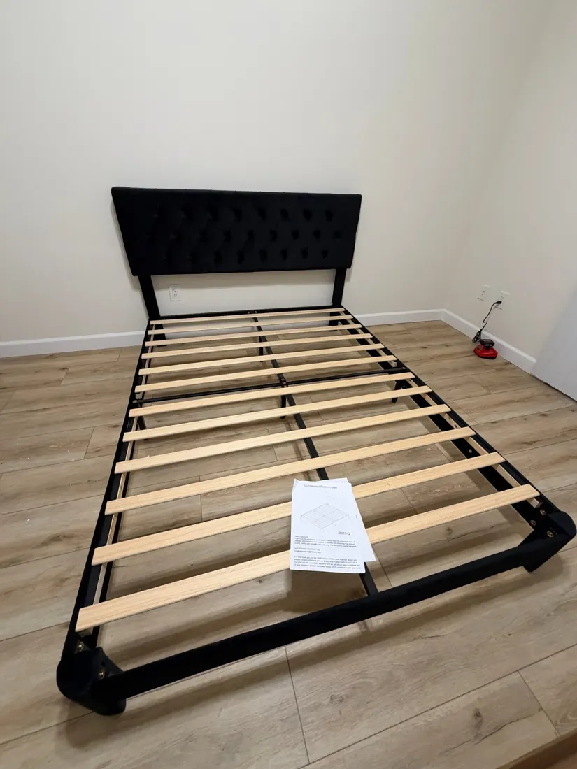 Queen upholstered bed frame assembled in Anaheim, October 2026