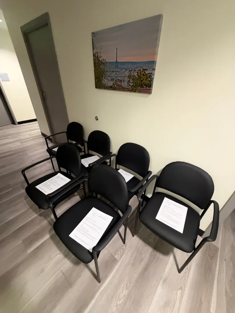 Six reception chairs assembled for a Newport Beach office, October 2026