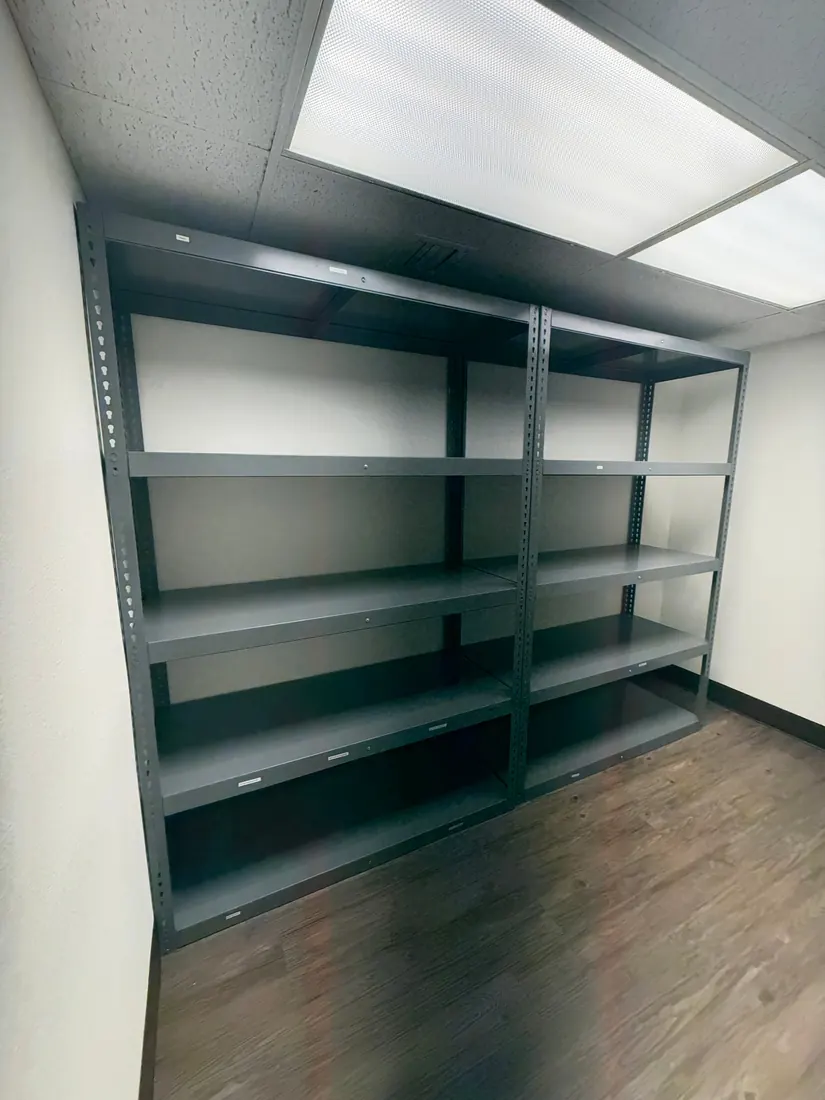 Steel storage shelving units assembled in a Santa Ana office, October 2026