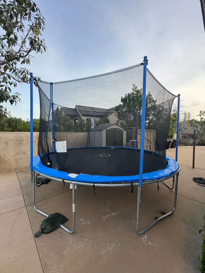Trampoline with safety enclosure assembled in San Juan Capistrano, April 2025