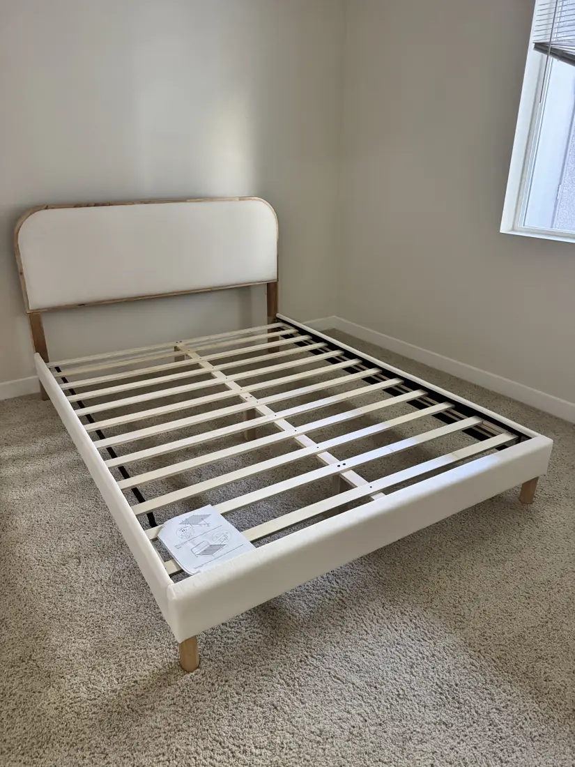 Upholstered platform bed frame assembled in Irvine, September 2026