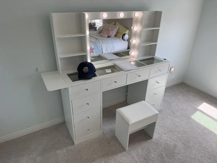 Vanity with lighted mirror